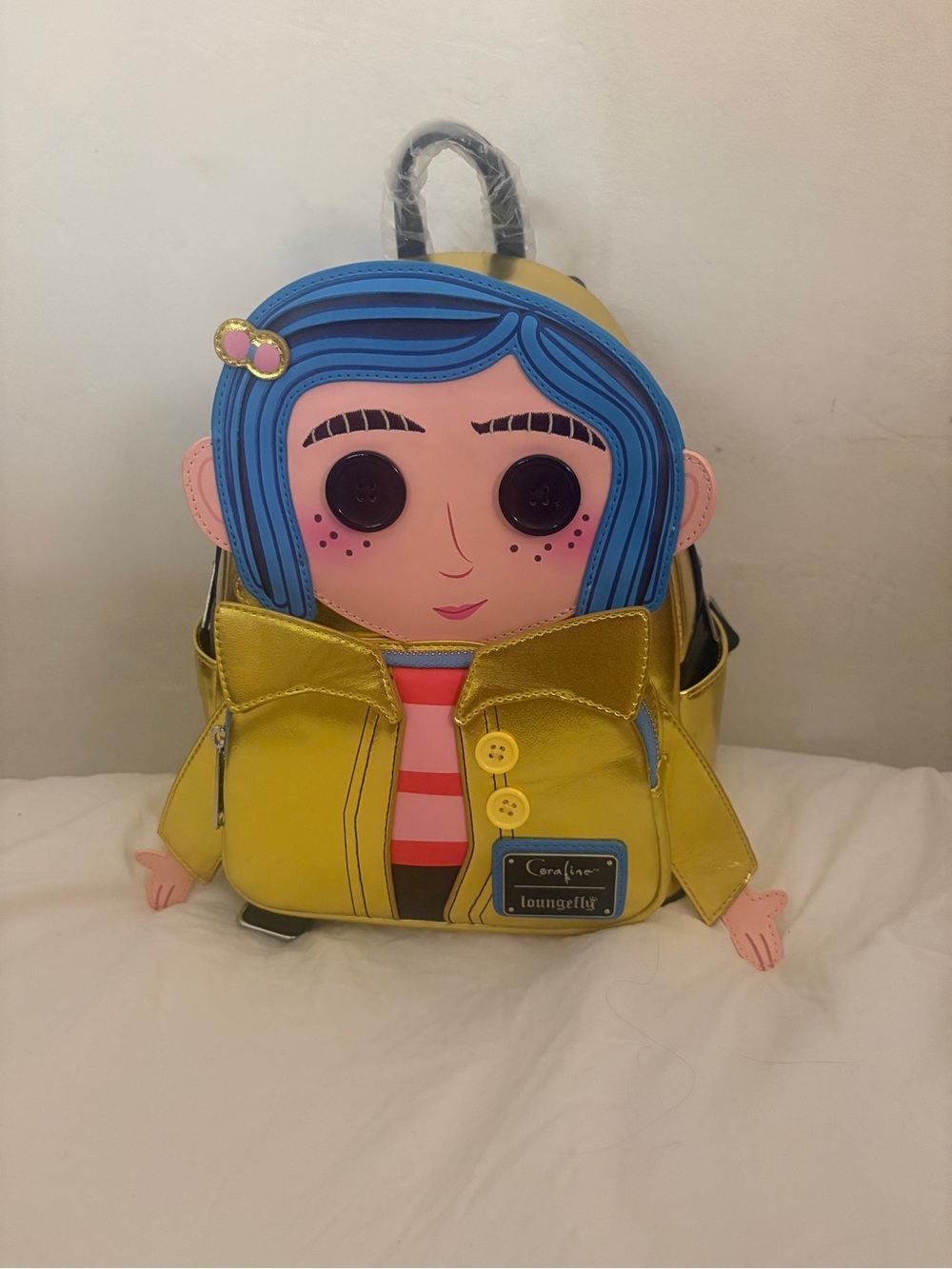 Loungefly Yellow Coraline Mini Backpack